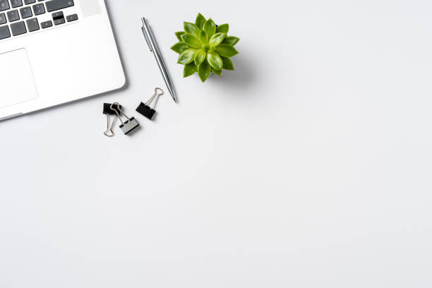 istock Laptop and accessories on white background 933579554
