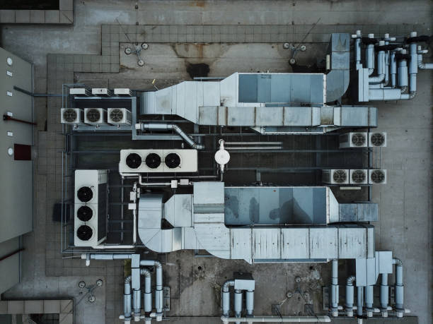 istock Air conditioning equipment atop a modern building 933582722