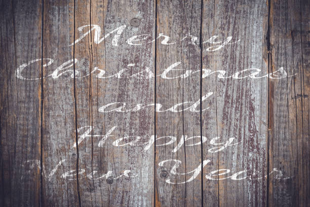 istock Christmas wishes on an old wooden plank. 933587430
