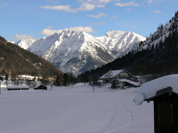 istock Great winter landscape with snow mountains in the background 933595628