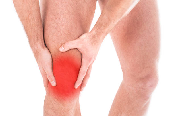 istock Man with knee pain over white background 933598202