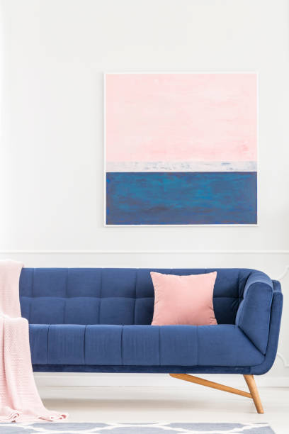 istock Painting in pastel living room 933606150