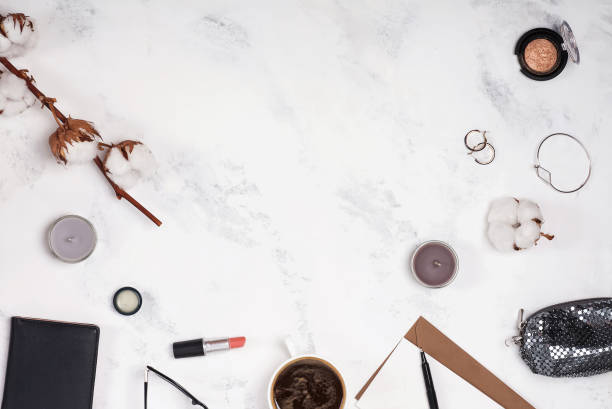 istock Flat lay with cotton branch and feminine accessories. 933616222