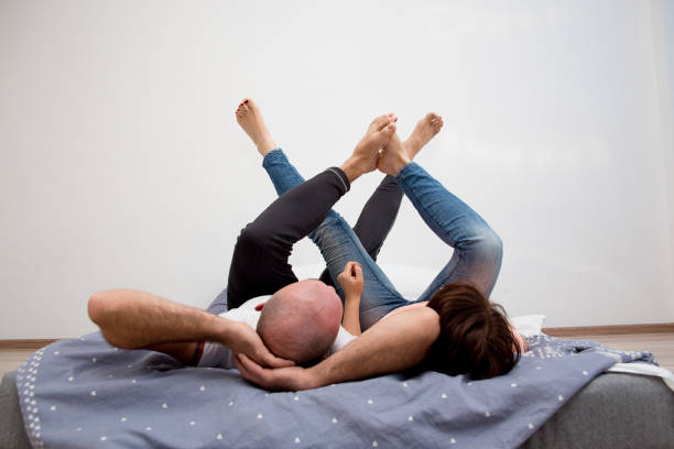istock Couple spending time in bed 933618900