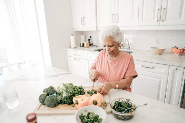 istock Preparing family salad 933628684