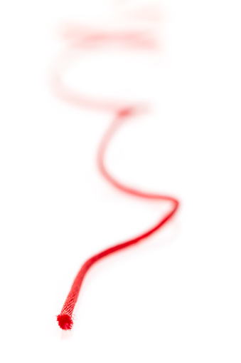 Red thread on white background