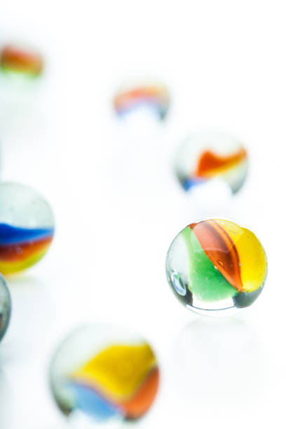 istock Many glass marbles isolated on white background 933633674