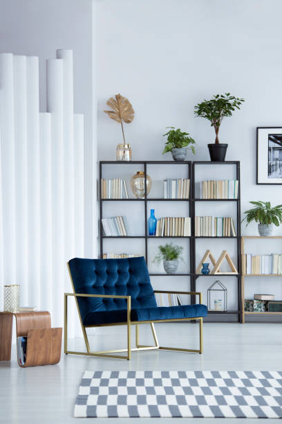 istock Blue armchair in living room 933633894
