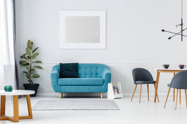 istock Turquoise flat interior with painting 933637424