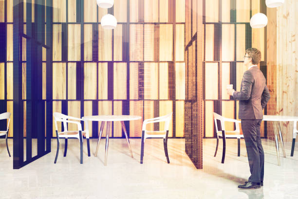istock Restaurant interior, wooden walls, man 933637534