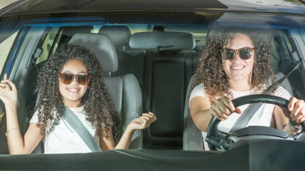 istock Mother and Daughter Having Fun in the Car 933640724
