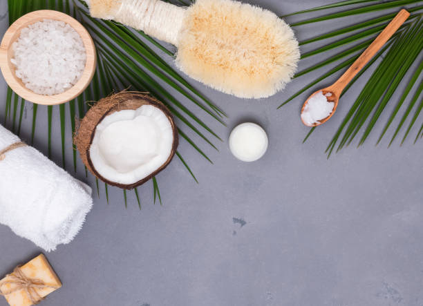 istock Coconut, brush and other spa related items, top view 933640914