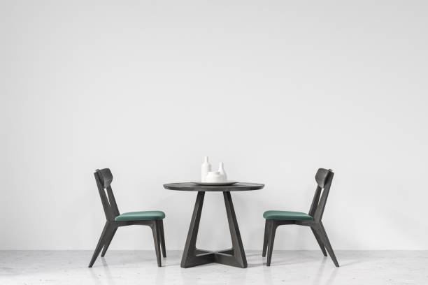 istock Round table and green and black chairs 933640938