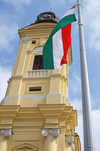 istock Hungarian flag next to a church tower 933641538