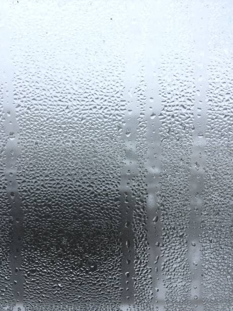 istock Lots of water droplets on window 933643342