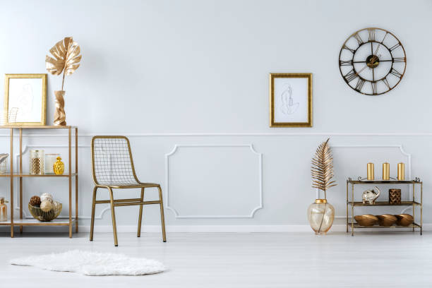 istock Luxurious gold living room interior 933647394
