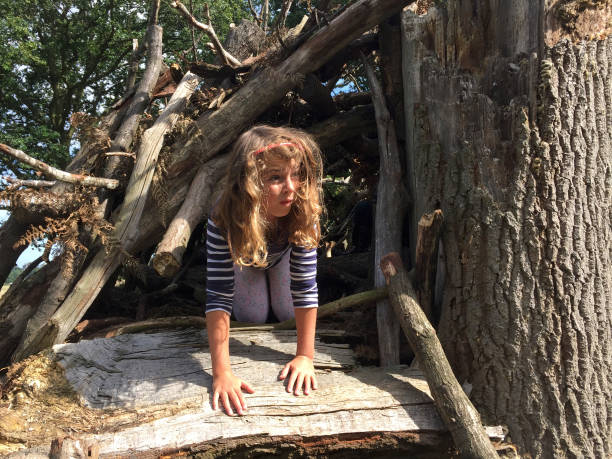 istock Young girl in tree house 933653654