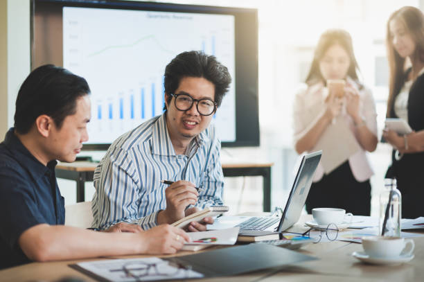 istock Business workers group meeting in office 933653936