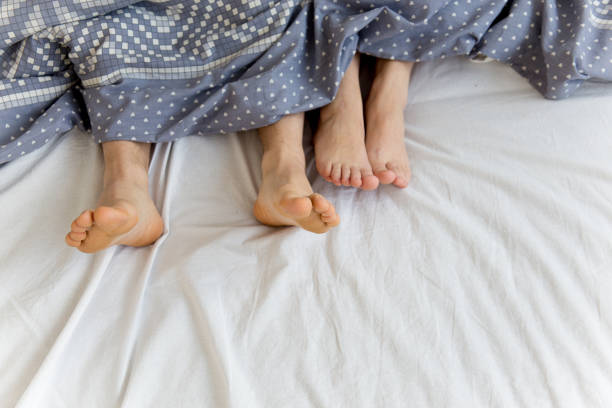 istock Couple enjoying breakfast in bed 933656386