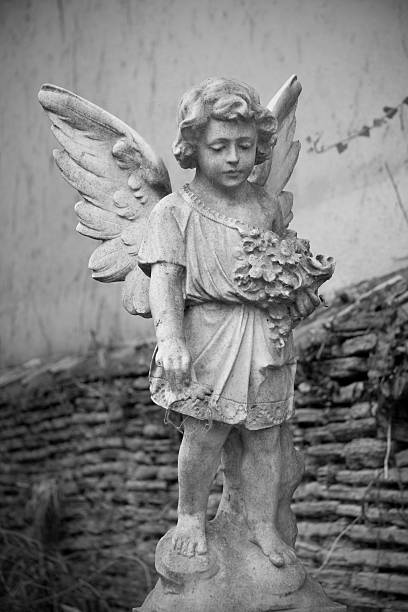 istock Grave stone in local church yard 93365770