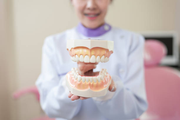 istock Female patient with dental checkup 933661704