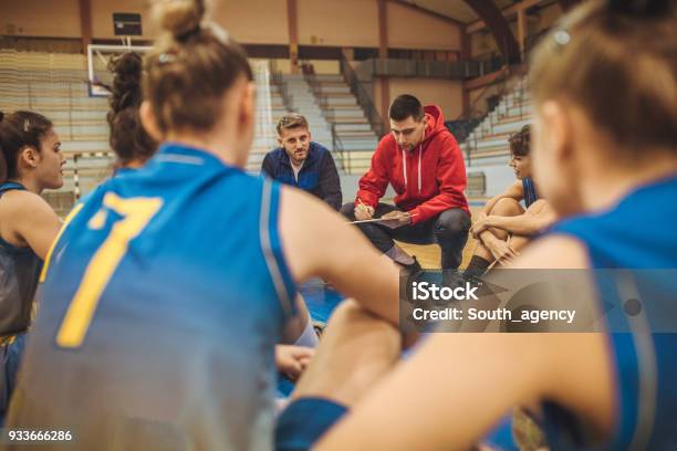 Coach Talking To Players Stock Photo - Download Image Now - Coach, Sport, Sports Team