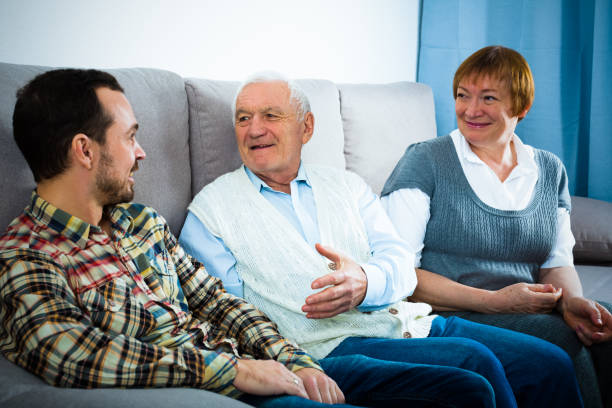 istock Grandparents and grandson talk 933681624