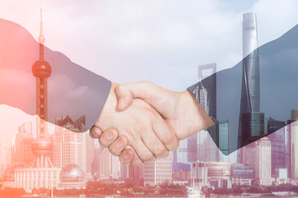 istock Deal or agreement business concept, handshake double exposure 933700366
