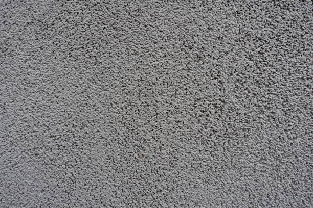 istock Texture of grainy gray wall (front view) 933701148