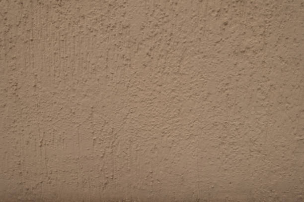 istock Surface of peach colored modern plastered wall 933701244