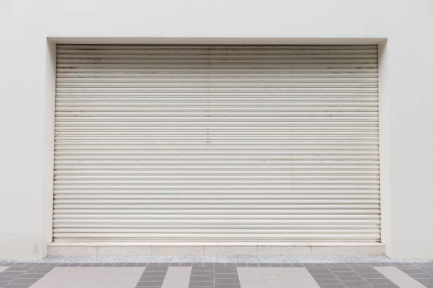 istock sidewalk by street wall & door 933707854