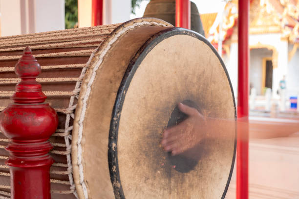 istock hand that plays drum: Wat Benchamabophit Dusitvanaram, marble temple, bangkok thailand 933732528