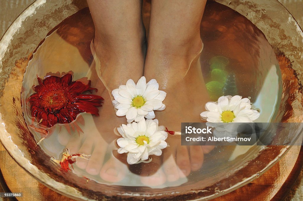 Massage of feet Massage of feet and water procedures Adult Stock Photo