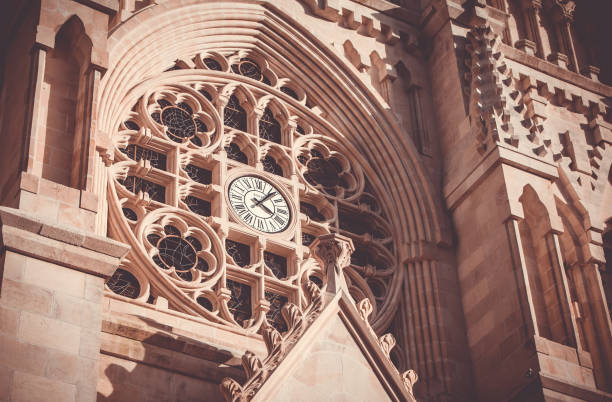 A close-up of the front clock of the Notre-Dame Church, in Cholet.
