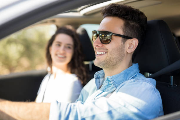 istock Happy young couple going on a road trip 933809396