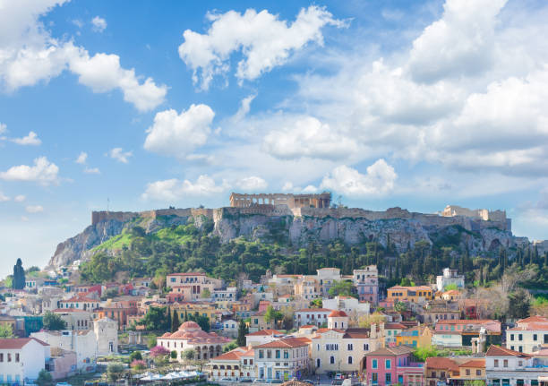 Skyline of Athenth with Moanstiraki and Acropolis hill with cloudy sky, Athens Greece