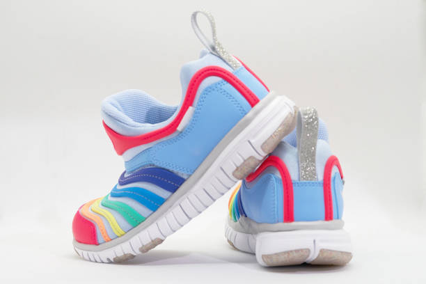 istock Colourful running shoes on white background,rear view 933815242