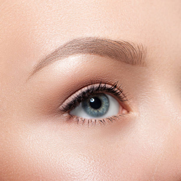 istock Beautiful gray female eye close-up. 933815558
