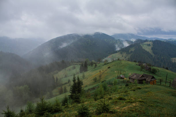 istock Morning dew fog sun rays in mountains 933826102