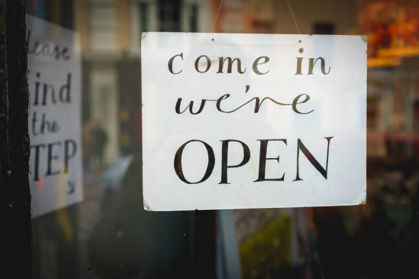 istock Open sign on a window shop. 933829356