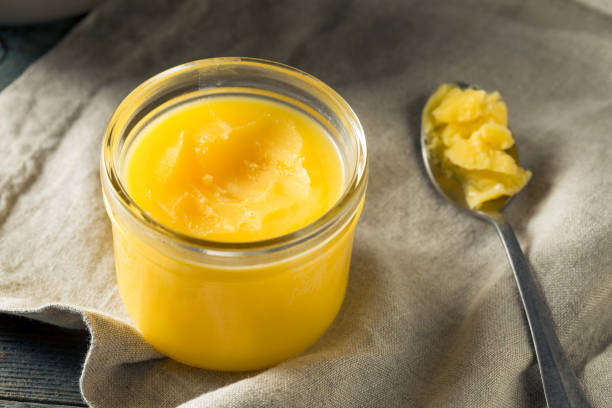 Homemade Clarified Butter Ghee Homemade Clarified Butter Ghee in a Bowl clarified butter stock pictures, royalty-free photos & images