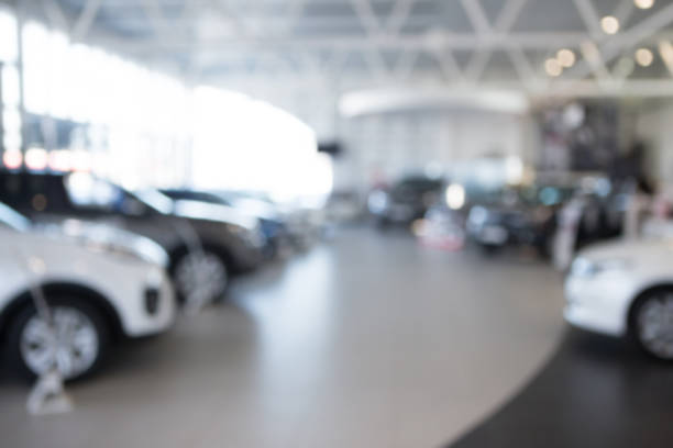 istock Car sales, market place, blured image 933840958