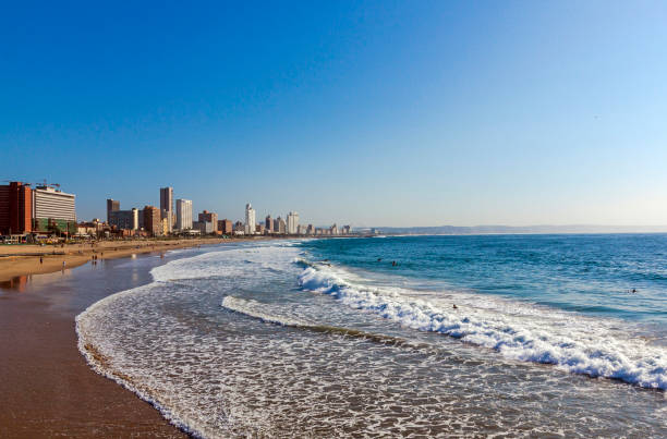 istock Coastal Shoreline against Blue Durban City Skyline 933843892