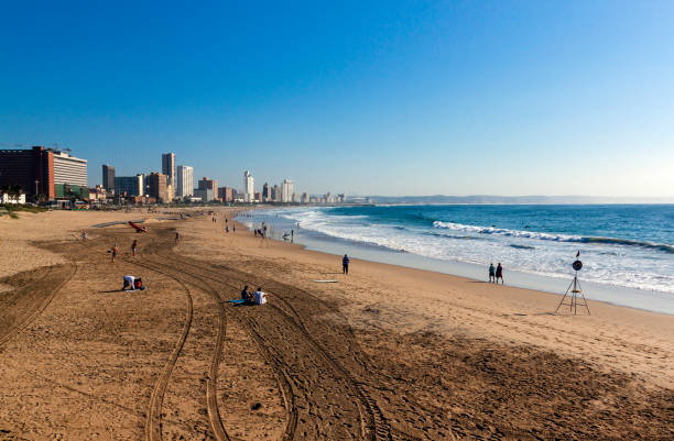 istock Coastal Shoreline against Blue Durban City Skyline 933843898