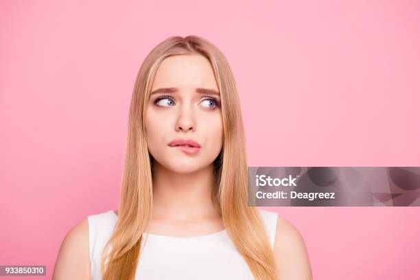 Problem Trouble Negative Nervous Sad Unhappy Upset People Concept Close Up Portrait Of Sweet Charming Tender Gentle Nervous Beautiful Attractive Elegant Stunning Girl Looking Side Isolated Background Stock Photo - Download Image Now