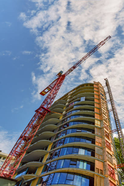 istock view from below upwards on the construction of a tower crane 933850432