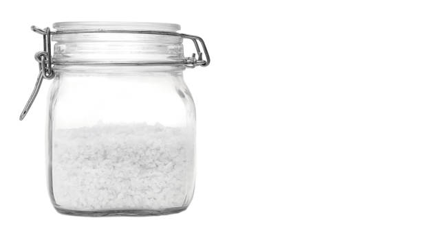 istock bottle with salt Isolated on white background. copy space, template 933857136