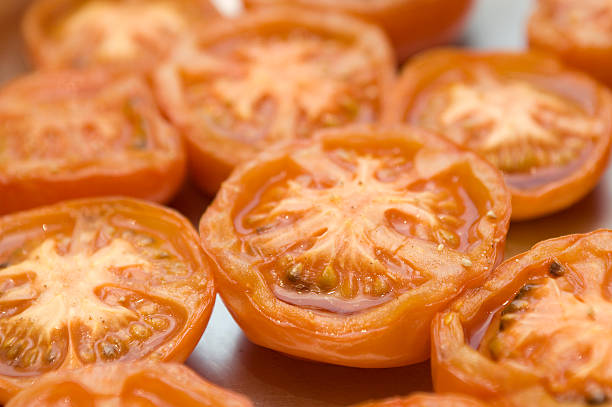 Grilled tomatos for breakfast stock photo