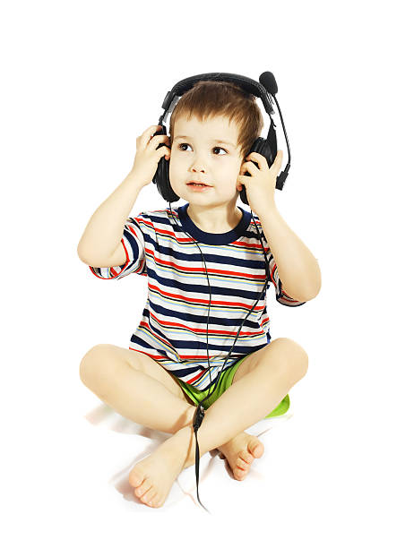 istock The child in headphones 93386121