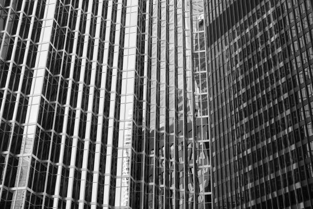 istock abstract architectural background of glass skyscapers 933862972